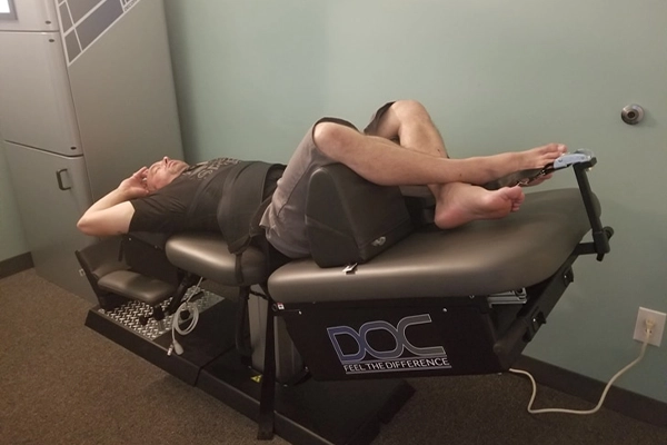 Chiropractic Santa Clarita CA Man On Decompression Table