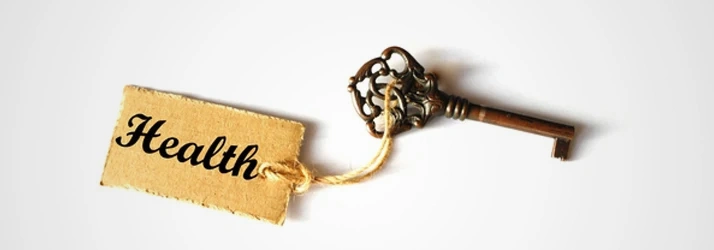 Key With A Tag Attached To It Reading "Health"
