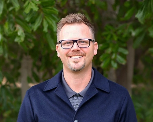 Chiropractor Ron Bittle Consulting Smiling Outdoors